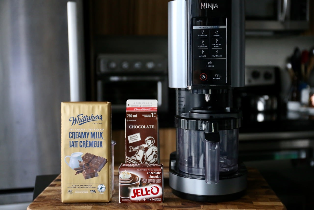 This easy 3 ingredient Ninja Creami ice cream recipe features milk, instant pudding mix and chopped chocolate bar.