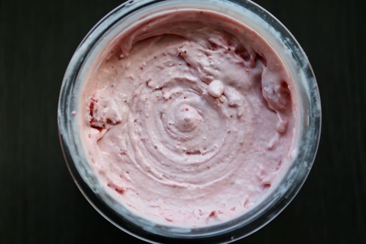 Ninja Creami Strawberry Ice Cream is finished and ready to eat when scoopable like soft serve.
