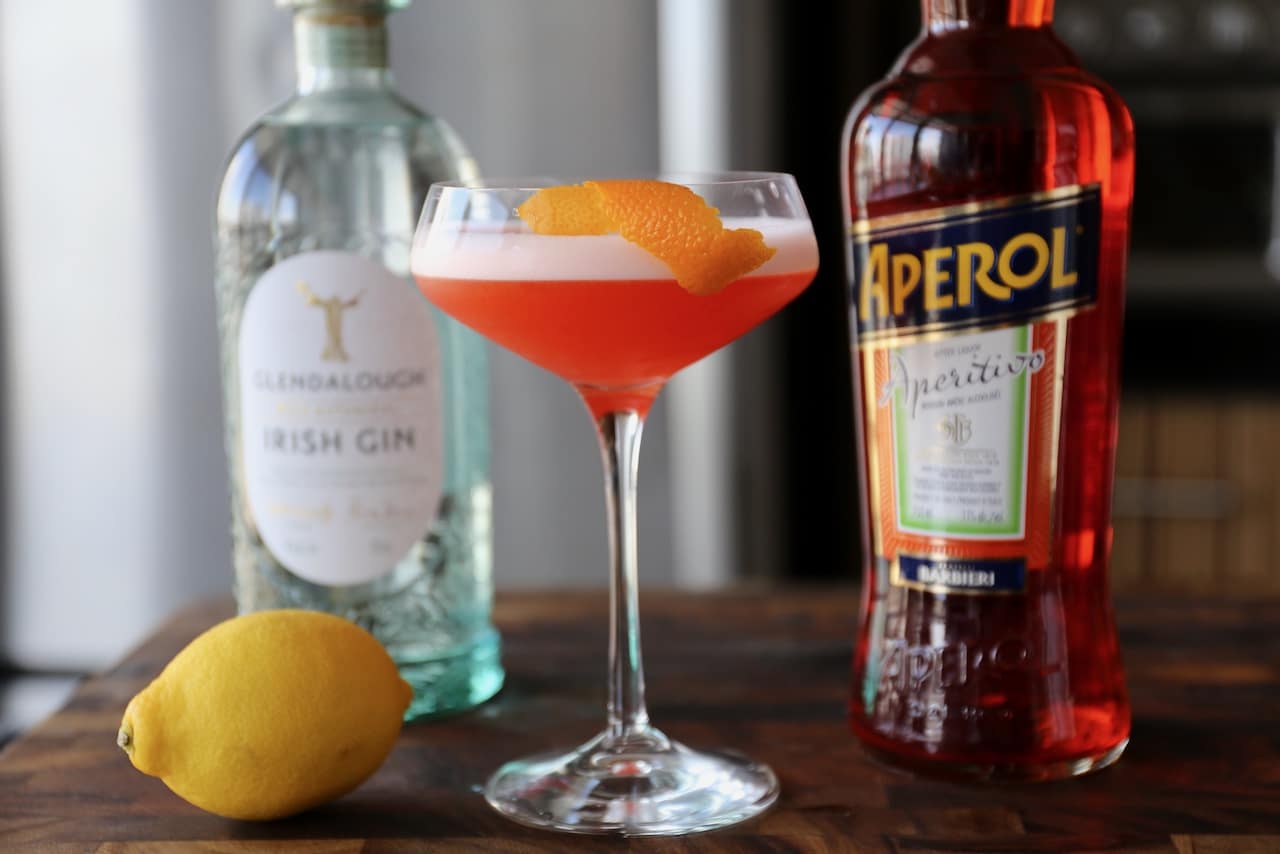 Garnish your Aperol Sour with a fresh lemon peel.