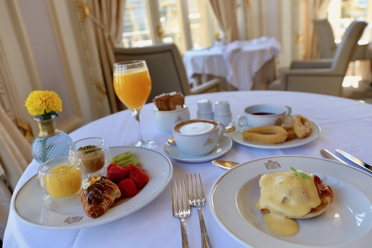 Hotel Maria Cristina breakfast featuring Eggs Benedicts and Chocolate & Churros.