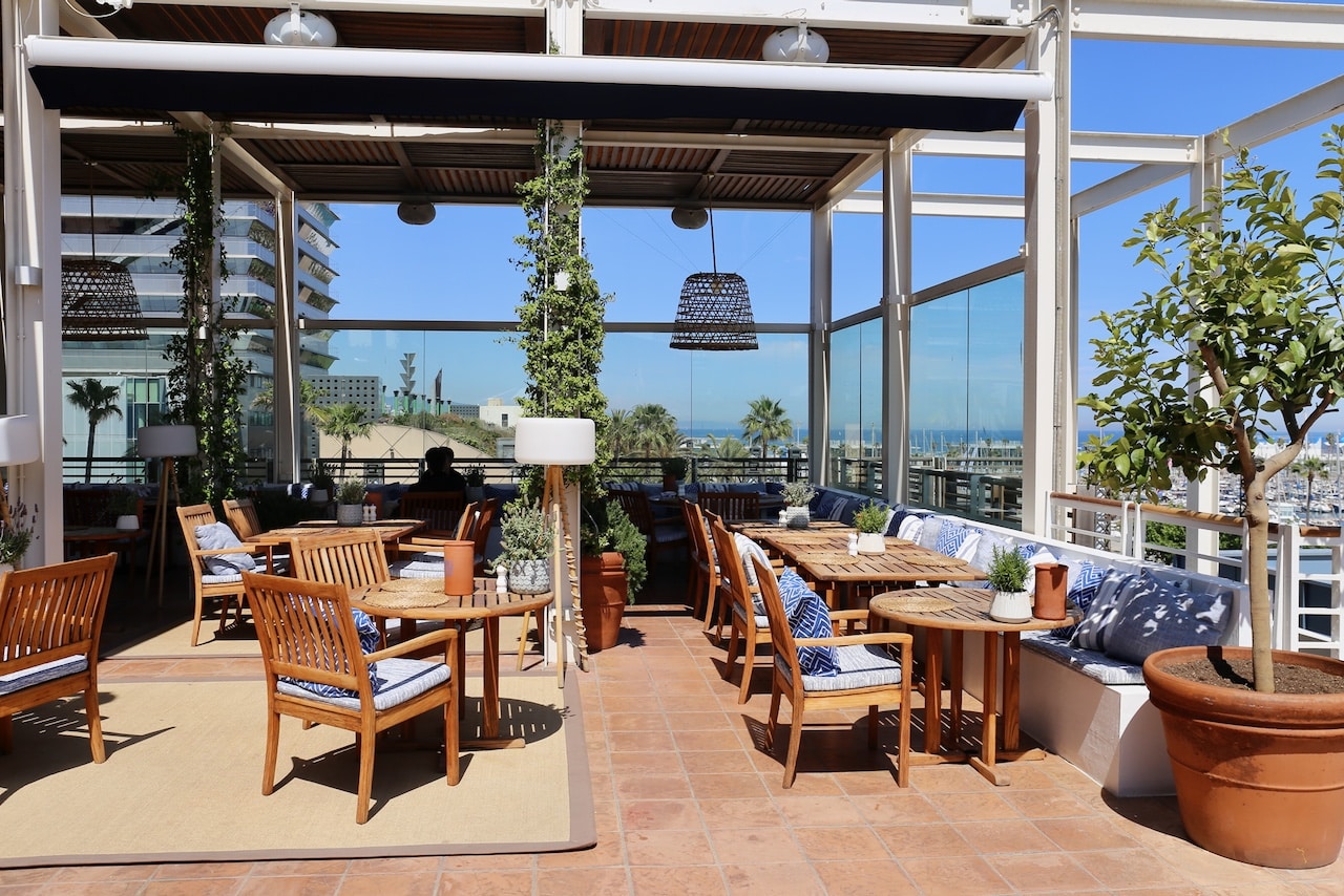 Al fresco dining at breezy Marina Coastal Club.