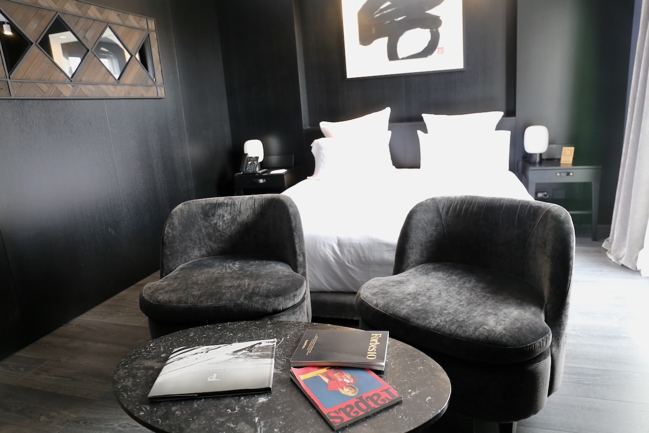 Each suite at The Pavilions Madrid features unique art work and big comfy bed.