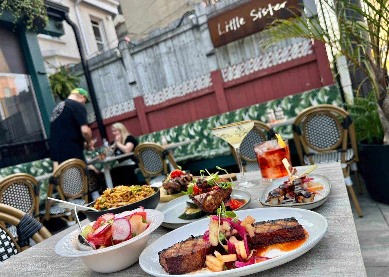 Enjoy Indonesian bites and craft cocktails at Little Sister's Happy Hour.