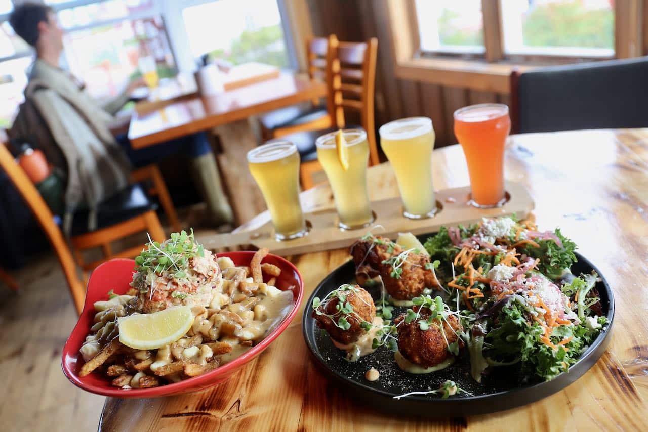 Order the lobster poutine at Pit Caribou Pub in Percé.