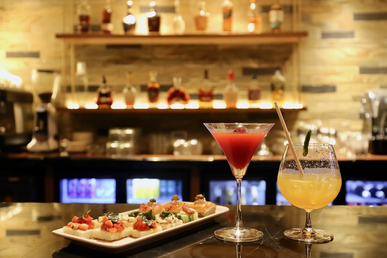 Enjoy craft cocktails and canapés at Bela after sunset. 