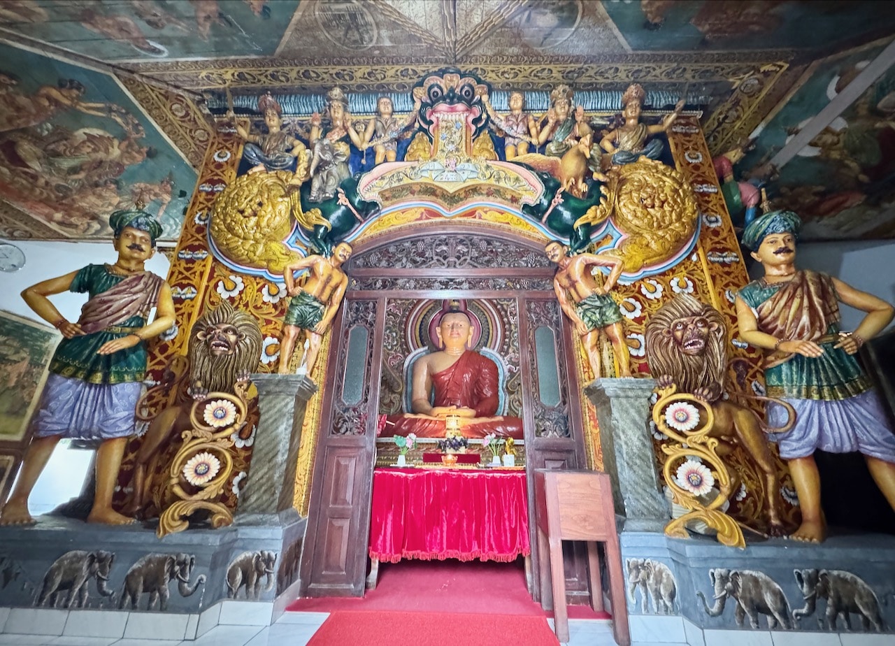 Visit a Buddhist temple on a tiny island on Koggala Lake.