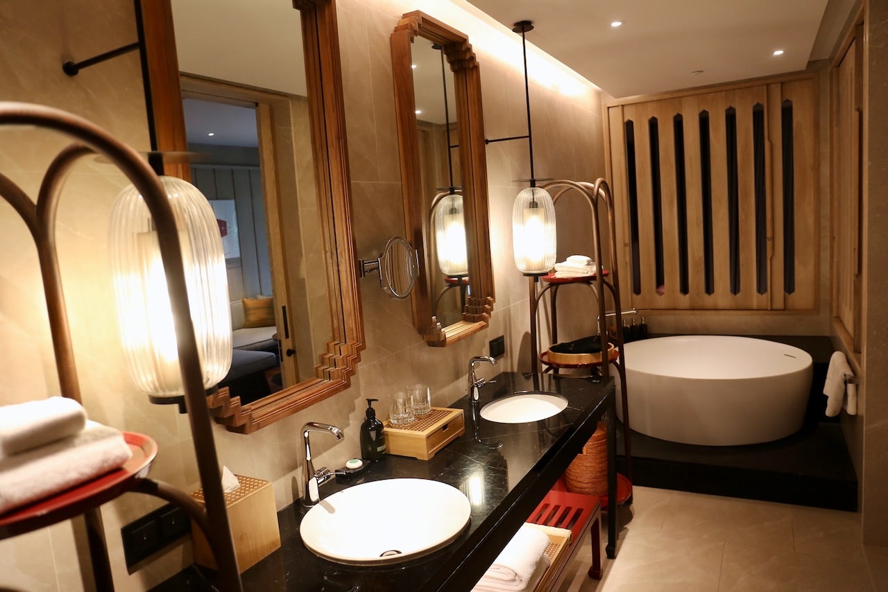 Bathrooms include a rain shower and separate oversized tub.