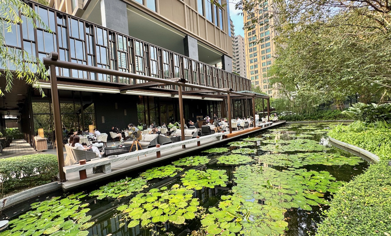 Kimpton Maa-Lai in Bangkok is a luxury hotel set amongst lush gardens and lily pad pond.