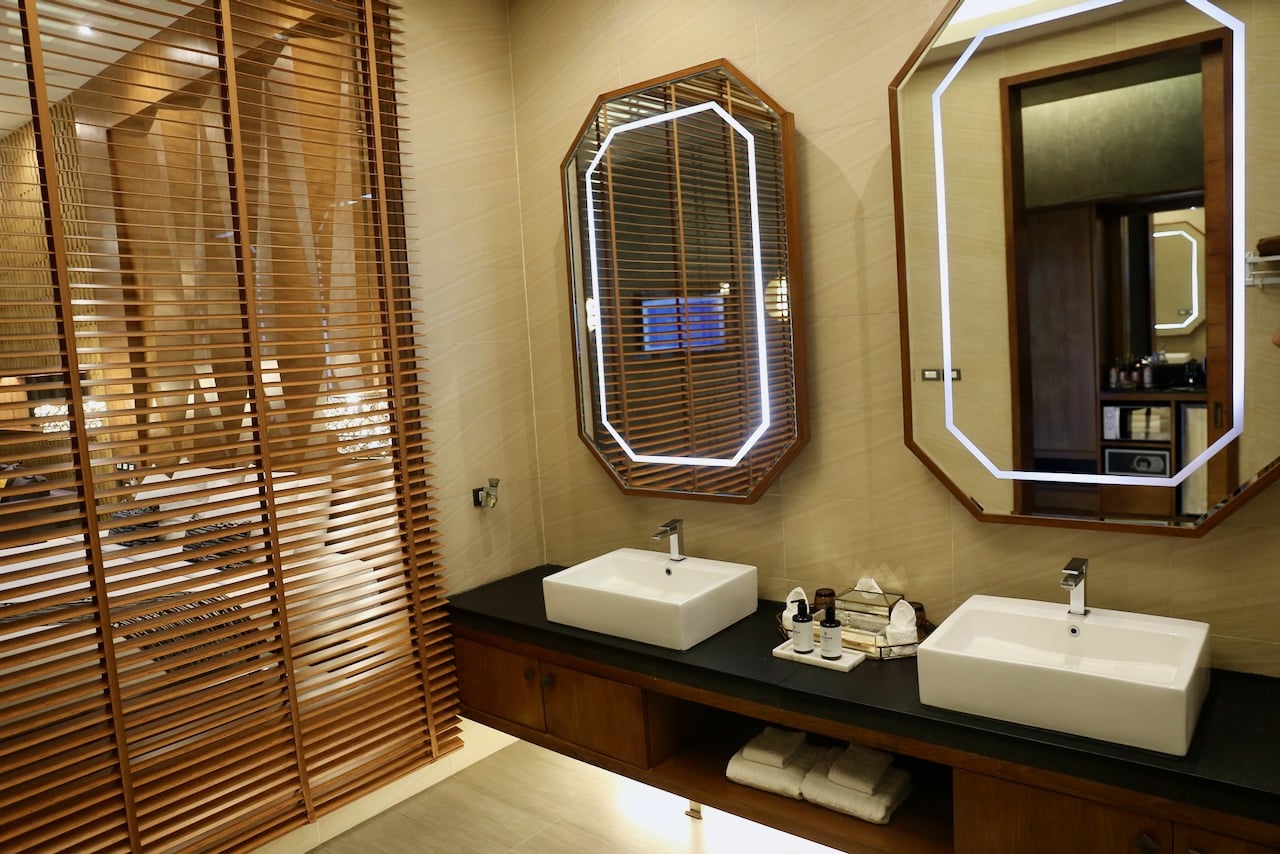 Villa bathroom with views overlooking the bedroom.