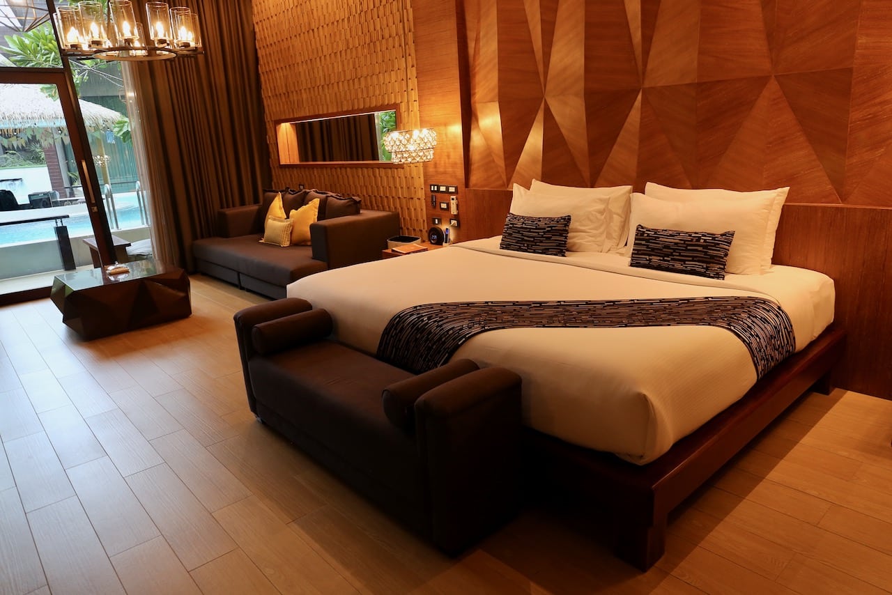Bedroom and oversized living space in one of the resort's pool villas.