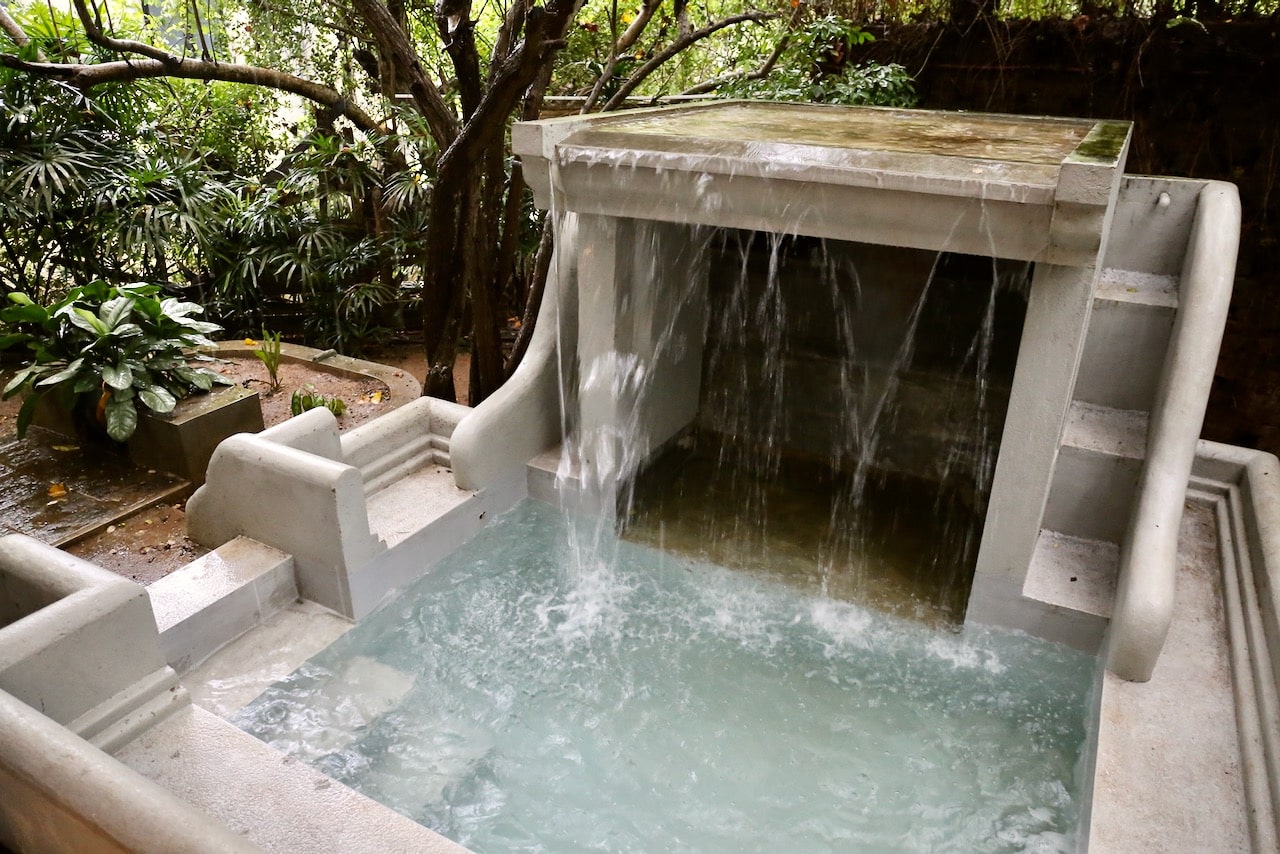 The honeymoon villa features a plunge pool and waterfall.