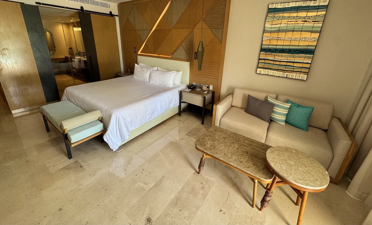 Spacious bedroom at Haven Riviera Cancun's Swim-Out Suite.