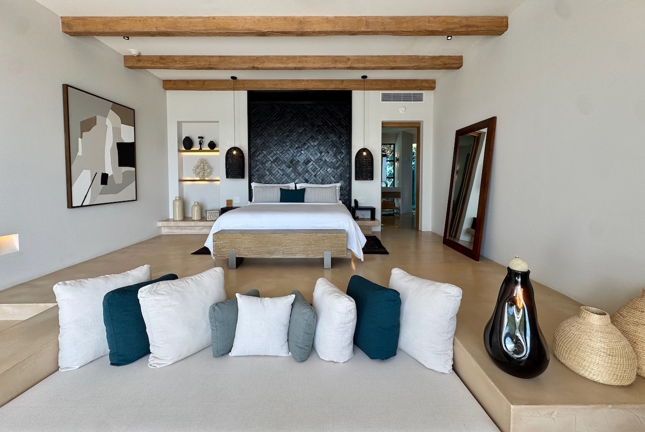 A spacious bedroom inside a pool villa at Kimpton Mas Olas Resort.