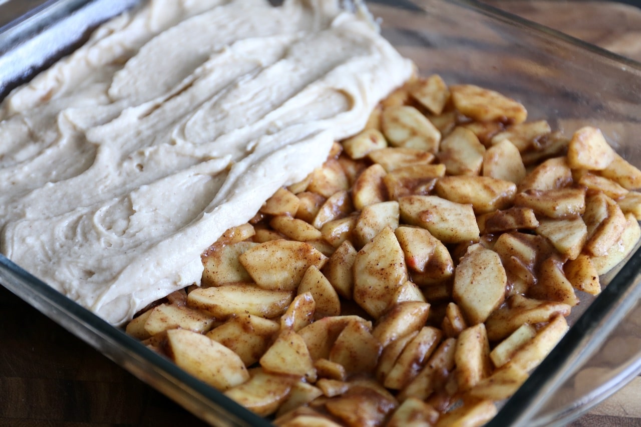 Slather buttermilk batter over apples before baking in the oven.