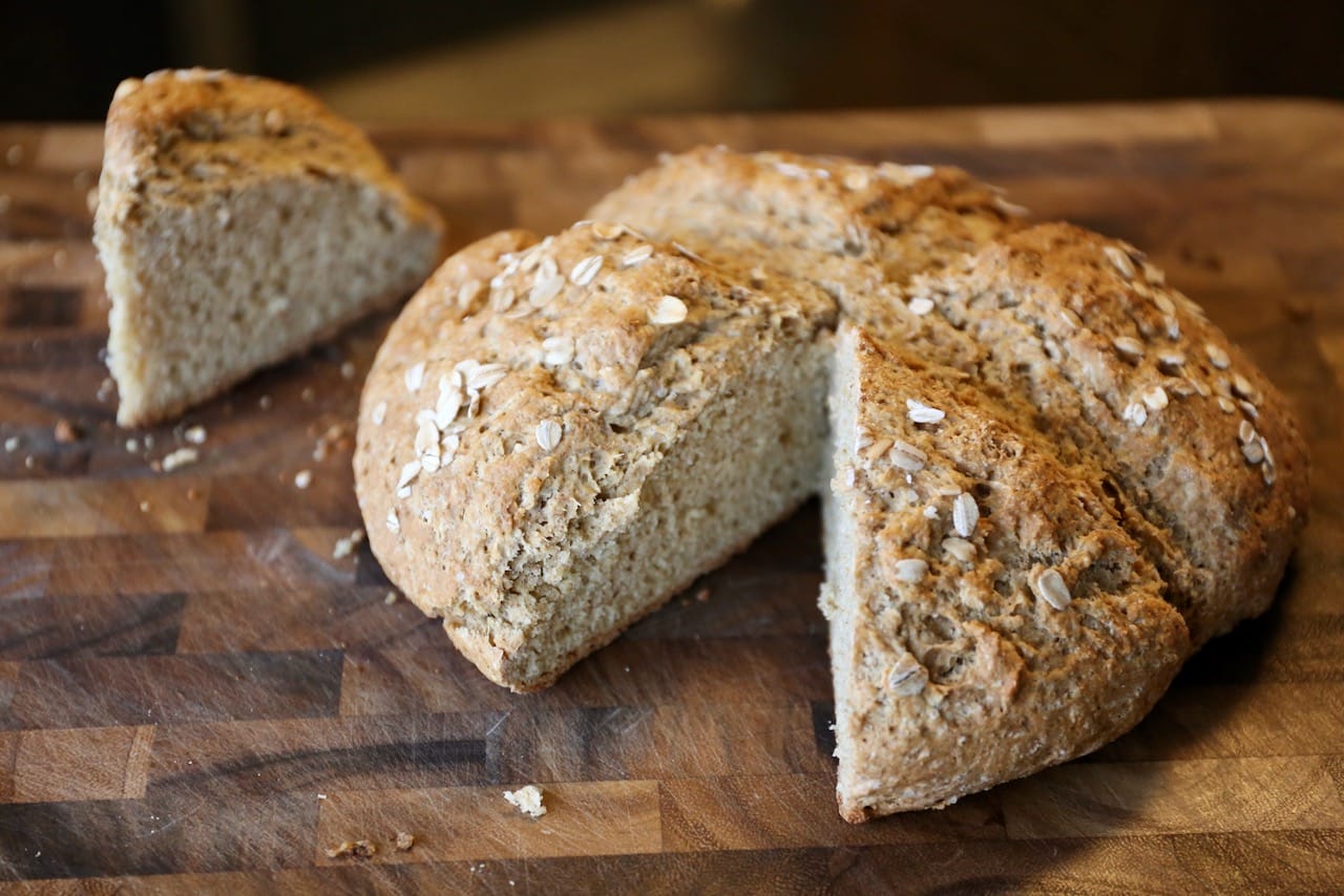 Slice soda bread into triangles and serve with Irish butter and jams.