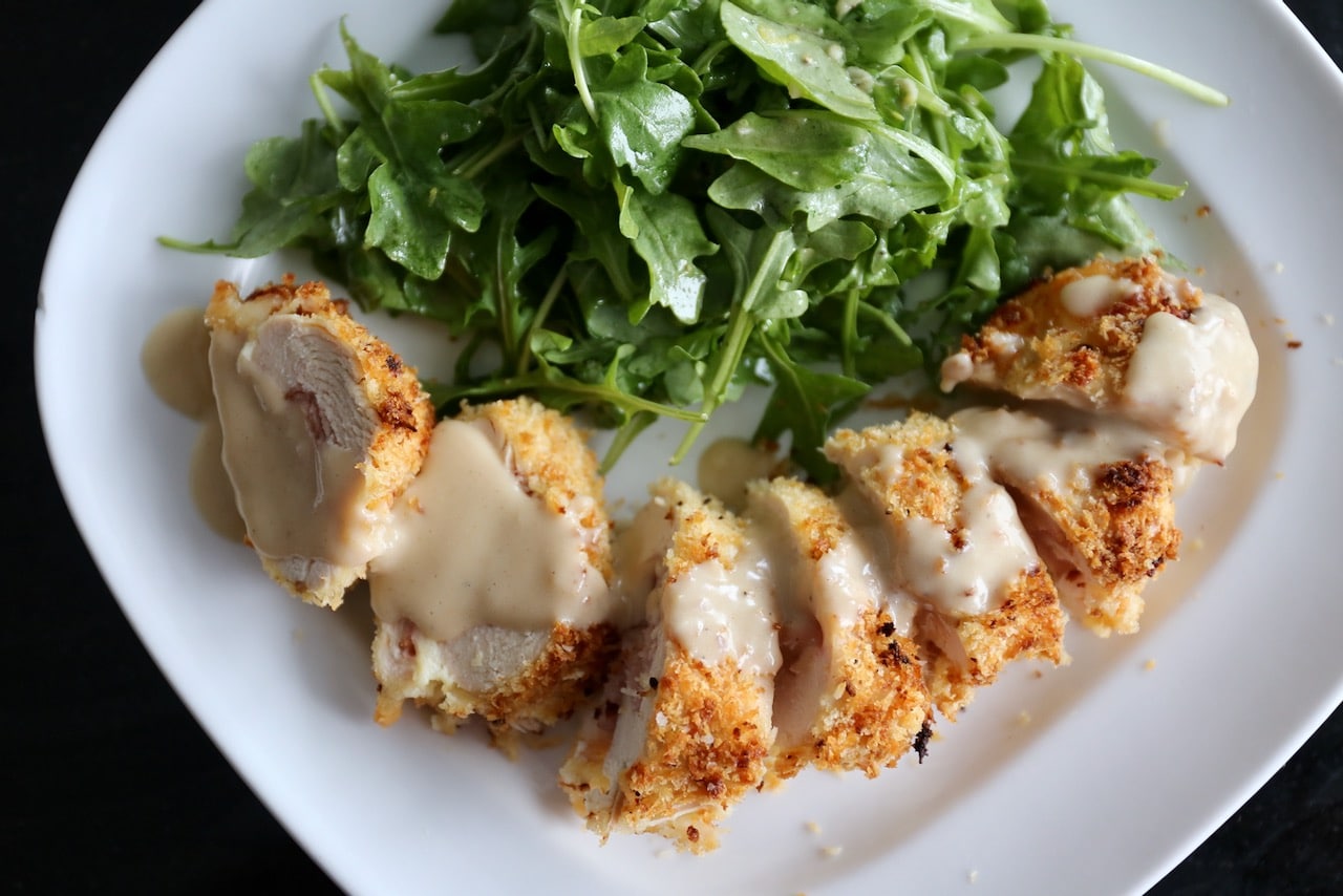 Drizzle Chicken Cordon Bleu with homemade dijon cream sauce.