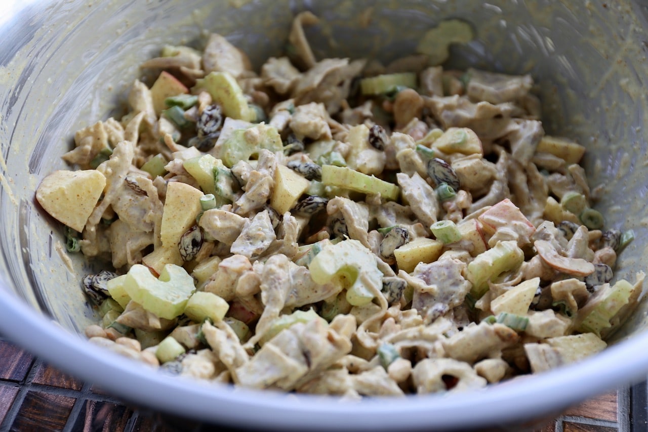 Toss the salad ingredients in a large mixing bowl until will combined.