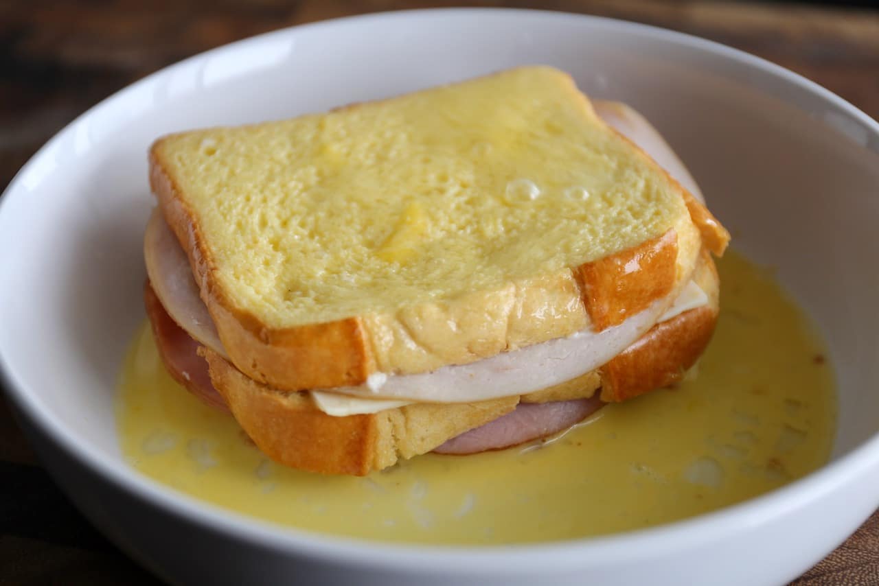 Dip the sandwich in egg mixture on all sides.