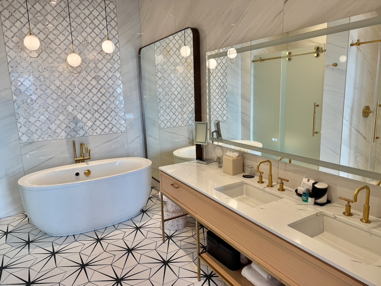 A bright white bathroom within the hotel's Rock Star Suite.