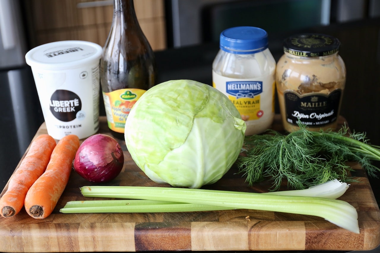 Traditional coleslaw ingredients include cabbage, onion, carrots and mayo.