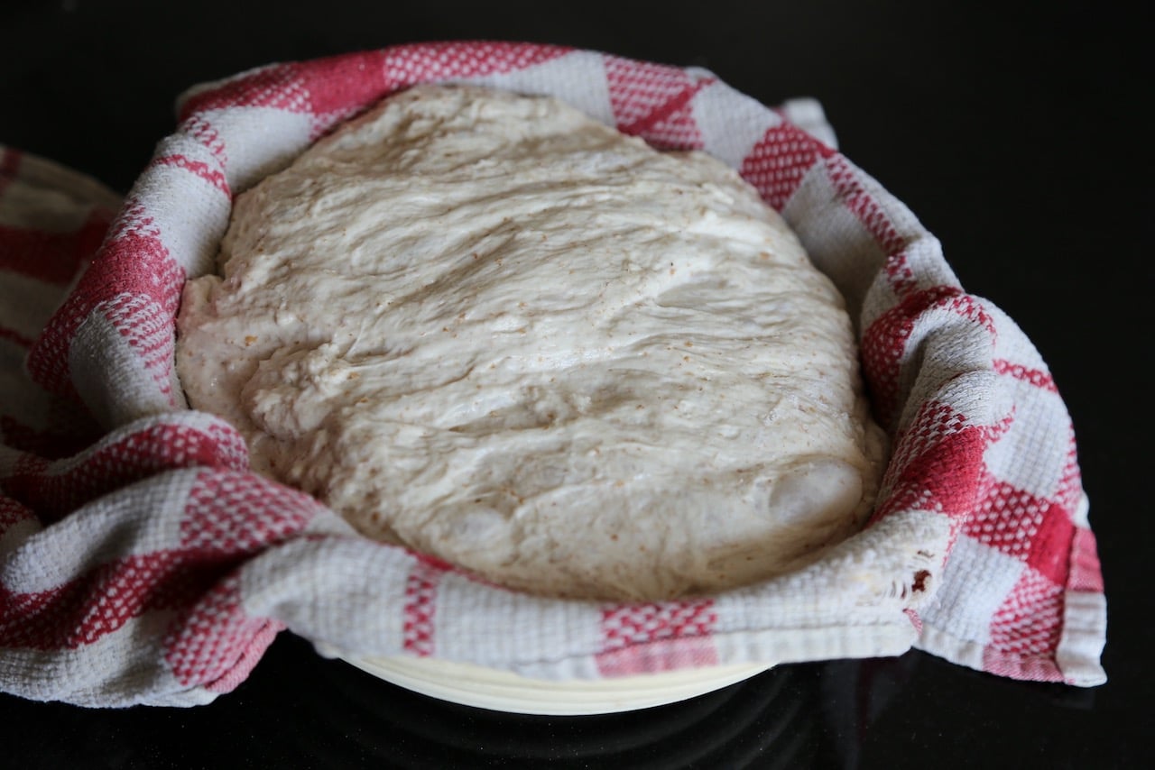 Let the bubbling high hydration  bread dough enjoy it's last ferment in a banneton proofing basket.