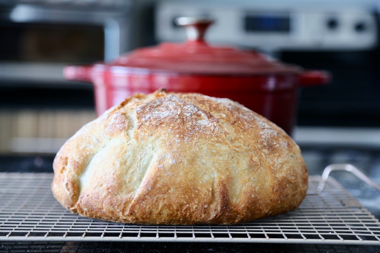 Let the loaf rest on a cooling rack for an hour before slicing so the loaf doesn't squish when slicing.